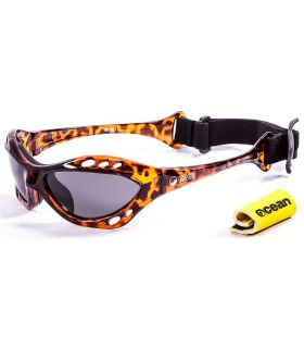 Gafas de sol deportivas Ocean Cumbuco marrón brillante con lentes polarizadas smoke y montura ligera.