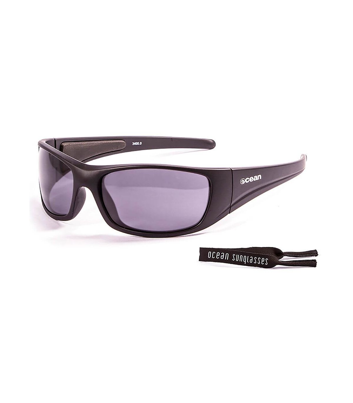 Gafas de sol Ocean Bermuda Mate Black Smoke con patillas flotantes de policarbonato ideales para el agua.