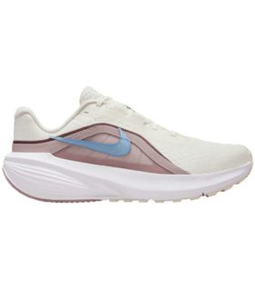 Nike Downshifter 14 mujer beige, zapatillas de running ligeras con pisada neutra y diseño elegante.