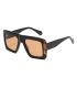 Gafas de sol polarizadas Ocean Corniche en color negro y marrón para deporte y uso casual.