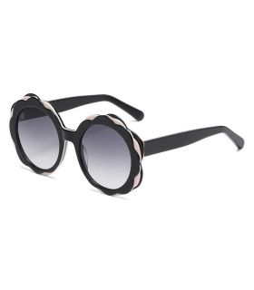 Gafas de sol polarizadas Ocean Deauville negras para mujer con lentes oscuras y diseño deportivo casual.