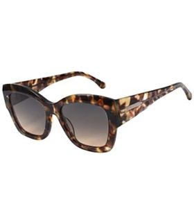 Gafas de sol polarizadas Ocean Denpasar con montura marrón y lentes smoke para mujer deportista.